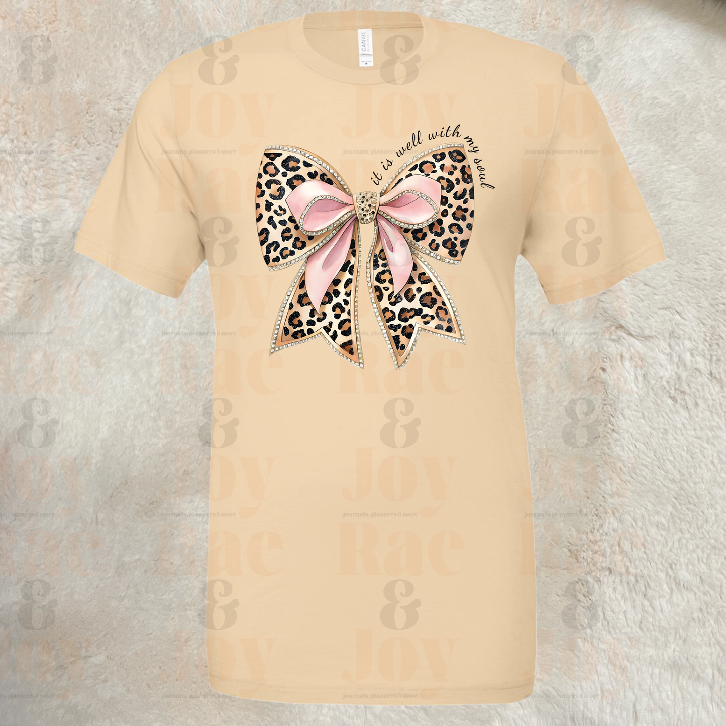 It Is Well With My Soul – Leopard Bow Christian T-Shirt – Bella + Canvas 3001 Soft Cream / S T-Shirts