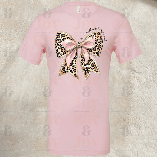 It Is Well With My Soul – Leopard Bow Christian T-Shirt – Bella + Canvas 3001 Soft Pink / S T-Shirts